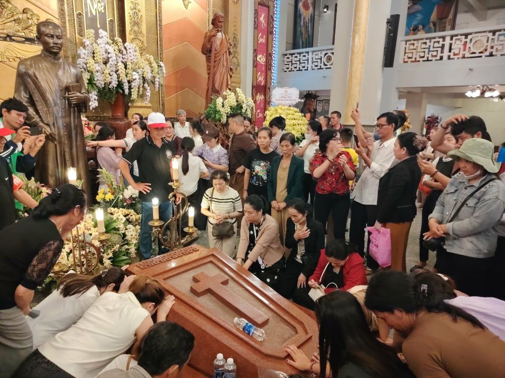 Pilgrims pray by the tomb of Blessed Francis Xavier Truong Buu Diep at Tac Say Pilgrimage Center in Vietnam's Mekong Delta on July 1, 2026. (OSV News/Joachim Pham)