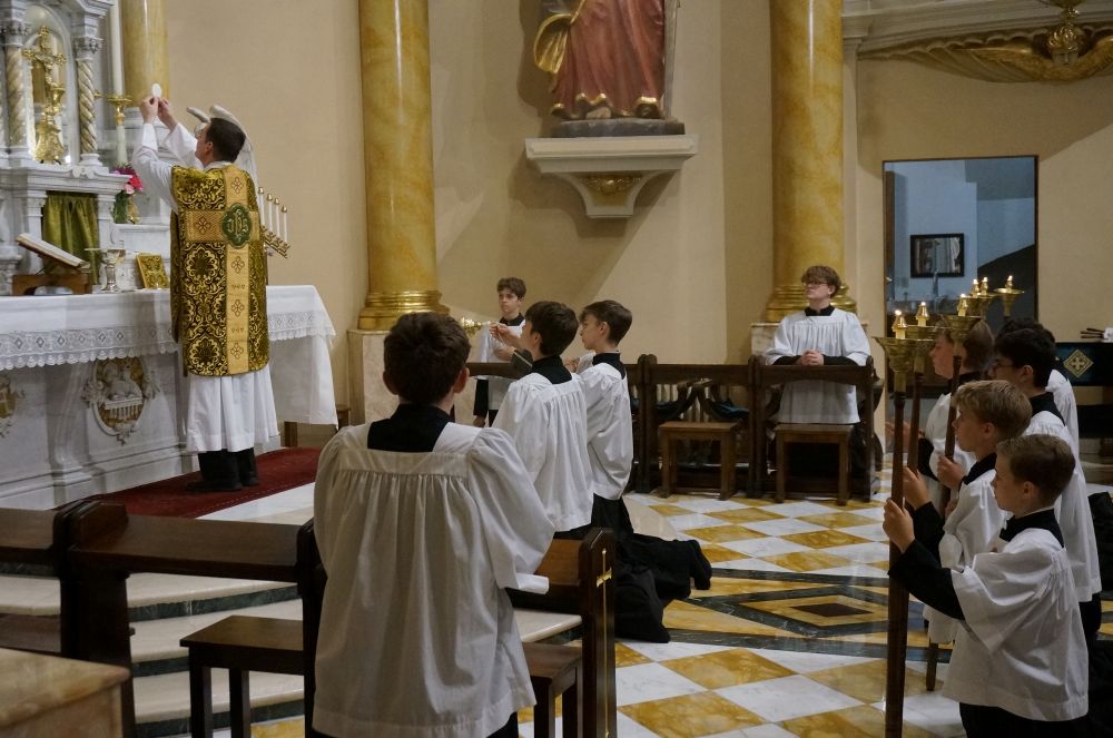 Fr. John Ubel, pastor of the Church of St. Agnes, celebrates the eucharistic prayer facing the altar, in the traditional custom, during one of the Catholic parish's Latin Masses in St. Paul, Minn., June 28, 2026. (AP /Giovanna Dell'Orto)