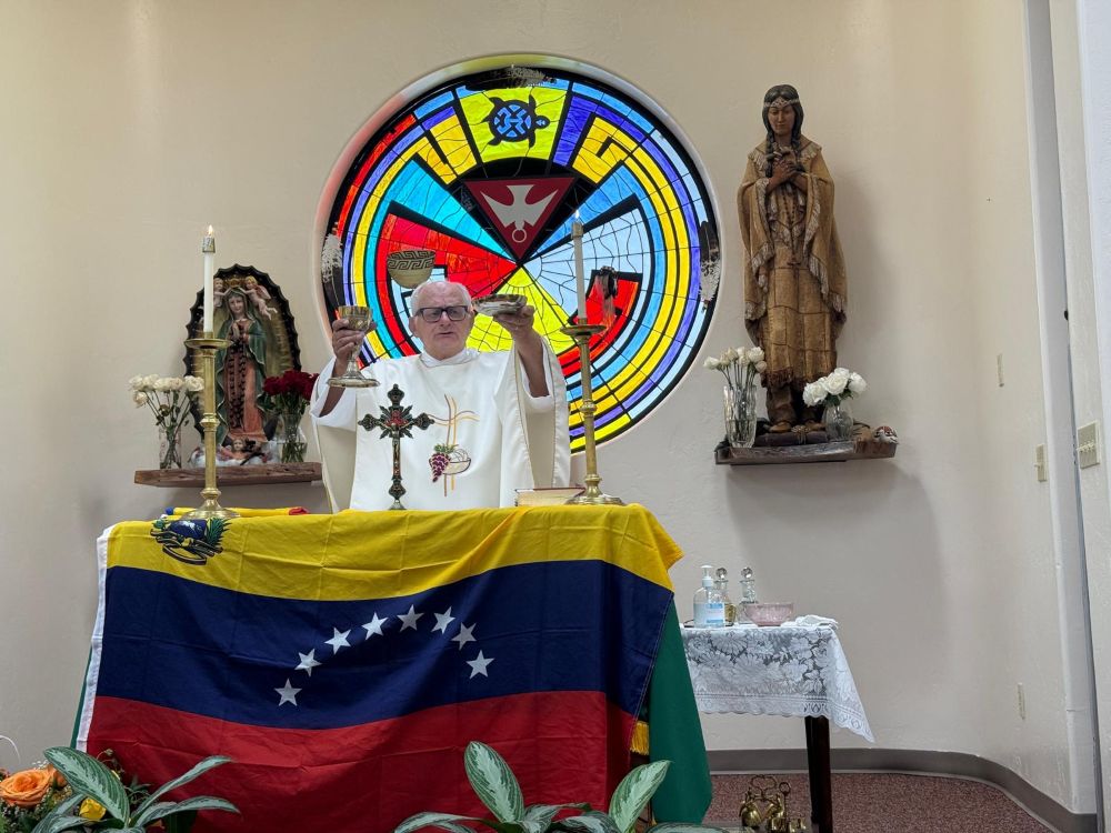 Fr. Raymond Riding of the Missionary Servants of the Most Holy Trinity celebrates Mass on June 27 at the St. Kateri Tekakwitha Parish in Tucson, Arizona to support Venezuelan migrants who are worried and in mourning after two devastating earthquakes in their homeland on June 24. (Anita Snow) 
