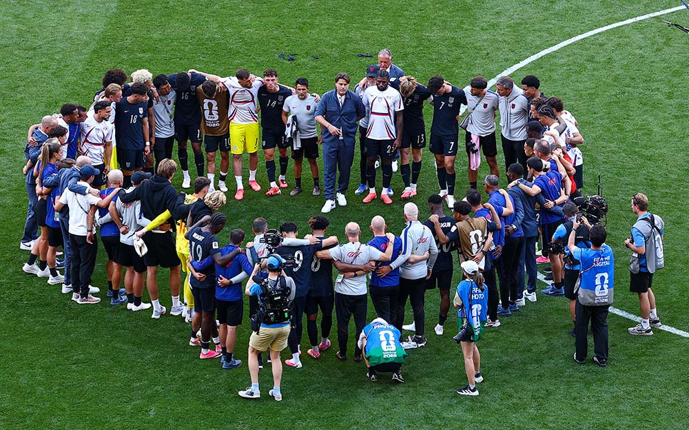 U.S. teammates huddle at Seattle Stadium after they were eliminated from the FIFA World Cup July 6, 2026. (OSV News/Reuters/Agustin Marcarian)
