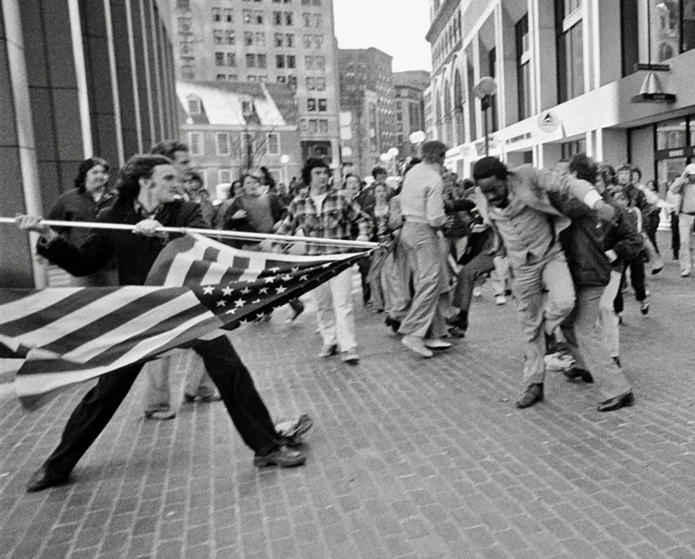 Stanley Joseph Forman, The Soiling of Old Glory, photographed 1976, printed in 1982, gelatin silver print. Fairfield University Art Museum, Museum purchase, 2024. © Stanley Forman