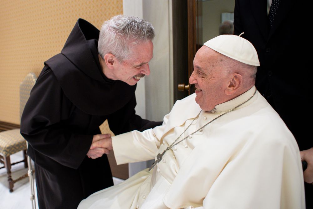 Franciscan Br. Michael Perry greets Pope Francis in 2024. (Courtesy of Siena University)