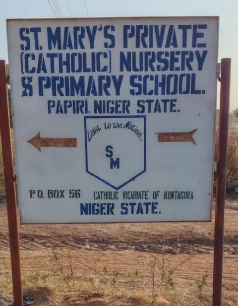 Road sign for St. Mary's Private Catholic School in Nigeria