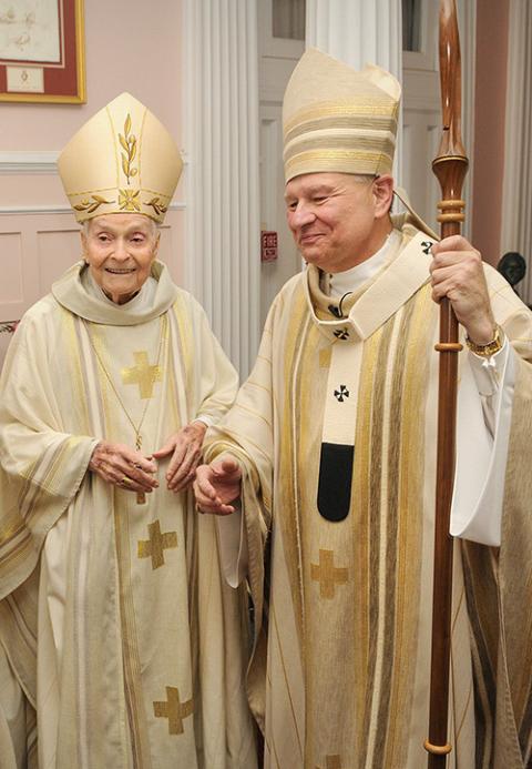 Archbishop Philip Hannan (left), who headed the New Orleans Archdiocese 1965-88, with Archbishop Gregory Aymond in 2009 (CNS/Clarion Herald/Frank J. Methe)