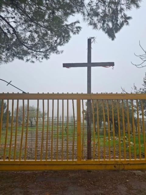 A cross is displayed on the Kisiya family farm in Palestine in a December 2025 photo. The  community helps to support the nearby Church of the Nativity and the Church of the Holy Sepulchre. (Courtesy of Alice Kisiya)