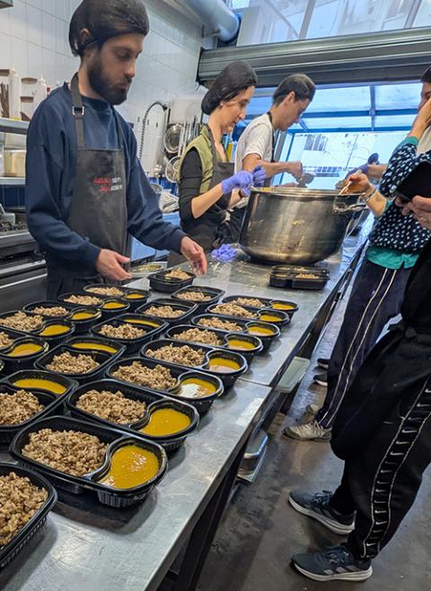 Meals prepared and served for Lebanese internally displaced persons at the Nation Station organization in Beirut, in March 2026. (Courtesy of Aid to the Church in Need/Charlotte Hallé)