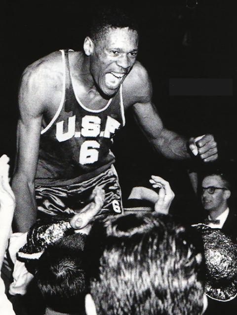 Bill Russell celebrates a victory with the University of San Francisco Dons. (Courtesy of the University of San Francisco)