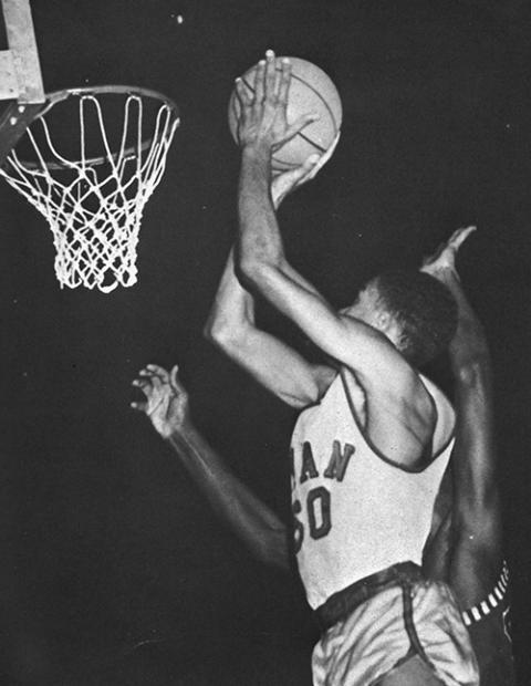 Willie Brown (50) plays for Father Ryan High School during the team's game with Pearl High School in January 1965. It was the first-ever high school basketball game between a mainly white high school and an all-Black high school in Nashville, Tennessee. (Courtesy of Burgundy Group)