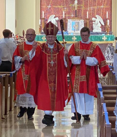 Scott Peyton, left, is pictured serving as a deacon during a confirmation Mass with Bishop J. Douglas Deshotel of Lafayette, Louisiana, center, and Casey Dugas, a then-transitional deacon, in June 2020. (Courtesy of Letitia Peyton)