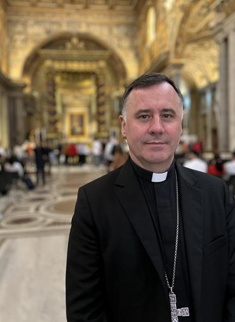 Cardinal Rolandas Makrickas, archpriest of the Basilica of St. Mary Major, poses for a photo in the nave of the basilica in Rome. (NCR photo/Justin McLellan)