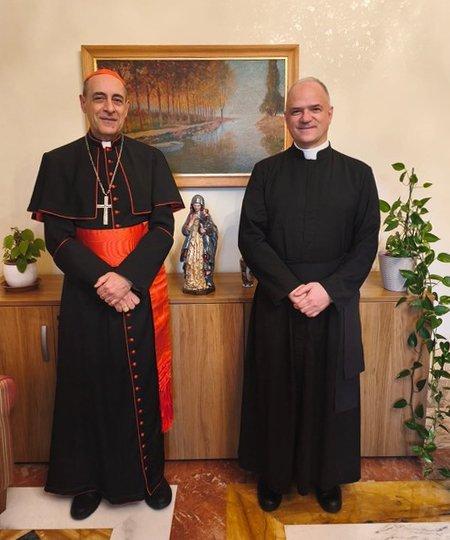 Cardinal Víctor Manuel Fernández, prefect of the Dicastery for the Doctrine of the Faith, and Father Davide Pagliarani, superior general of the traditionalist Society of St. Pius X, are pictured at the Vatican Feb. 12, 2026. (OSV News photo/courtesy Dicastery for the Doctrine of the Faith)