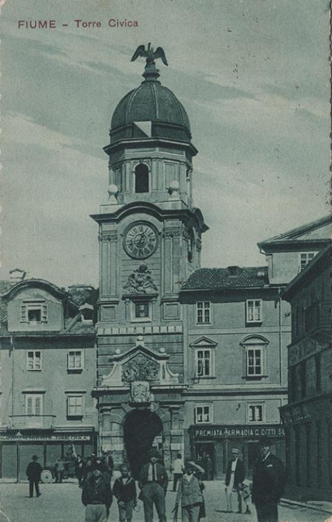 The half-decapitated Habsburg eagle is seen atop the City Tower in an undated postcard of Fiume. (Wikimedia Commons)