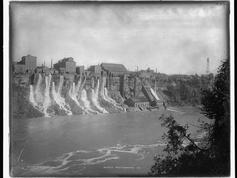 19th-century factories dump wastewater into a neighboring river.