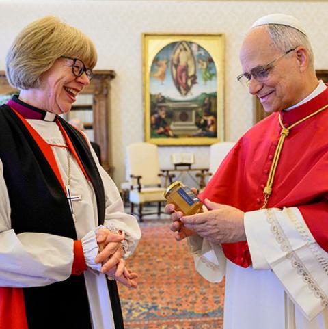 Pope Leo XIV receives a gift of honey from Anglican Archbishop Sarah Mullally of Canterbury during their meeting at the Vatican April 27, 2026. (OSV News/Vatican Media/Simone Risoluti)