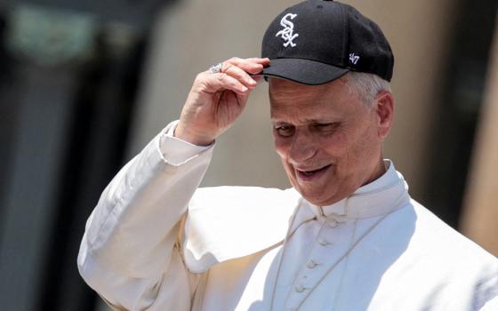 Pope Leo XIV wears a Chicago White Sox baseball cap during his weekly general audience in St. Peter's Square at the Vatican, June 11, 2025. (OSV News/Reuters/Remo Casilli)