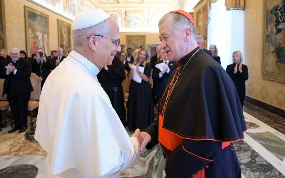 Pope Leo XIV greets Cardinal Blase Cupich of Chicago during an audience at the Vatican Oct. 9 with a pilgrimage of labor union leaders from Chicago. (CNS/Vatican Media)