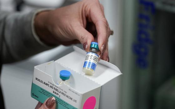Dr. Leigh Bragg, pediatrician at Tiger Pediatrics, holds an MMR vaccine in Easley, S.C., Feb. 6, 2026. The MMR vaccine is a highly effective, safe, 2-dose immunization that protects against measles, mumps, and rubella. (OSV News/Reuters/Jayla Whitfield-Anderson)