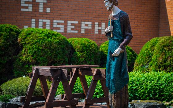 A statue of St. Joseph the Worker stands outside of St. Joseph Church in Oneida, Wisconsin. The feast day of St. Joseph the Worker, the foster father of Jesus and a carpenter, is May 1. (OSV News/Sam Lucero)