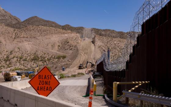 Contractors are using explosives to carve out the side of the landmark Cristo Rey mountain that oversees two countries and three states. (Gaby Velasquez/Puente News Collaborative)