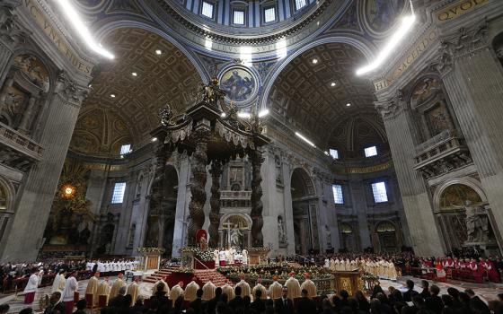 Pope Francis celebrates Mass marking the feast of the Epiphany in St. Peter's Basilica at the Vatican Jan. 6, 2018. Author Bruce Feiler tells the story of his visit to the basilica in the first chapter of his new book A Time to Gather. (CNS/Paul Haring)