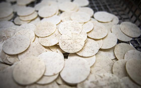 Freshly baked and cut altar bread is waiting to be sorted in the bakery at the Monastery of St. Clare in Langhorne, Pennsylvania, July 21, 2021. (OSV News/CNS/Chaz Muth)
