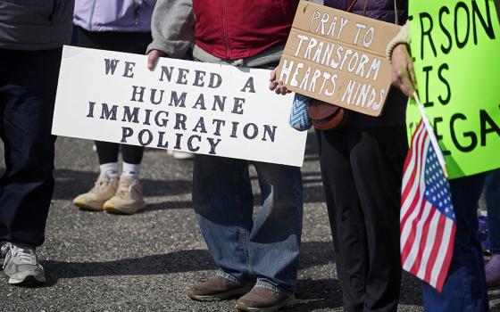Protesters gather at a pro-immigrant rally on the campus of the U.S. Citizenship and Immigration Services field office in Holtsville, New York, April 12, 2026. Demonstrators were protesting a proposed detention facility inside the field office that would be used to hold immigrants taken into custody by ICE officers. (OSV News/Gregory A. Shemitz)