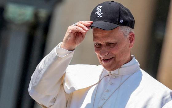 Pope Leo XIV wears a Chicago White Sox baseball cap during his weekly general audience in St. Peter's Square at the Vatican June 11, 2025. (OSV News/Remo Casilli, via Reuters)
