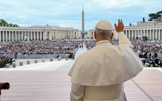 Pope Leo XIV waves to those gathered in St. Peter's Square at the Vatican during his weekly general audience May 6, 2026. (CNS/Vatican Media)