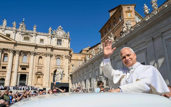 Pope Leo XIV greets visitors and pilgrims from the popemobile while riding around St. Peter’s Square at the Vatican before his weekly general audience May 27, 2026. (CNS/Vatican Media)