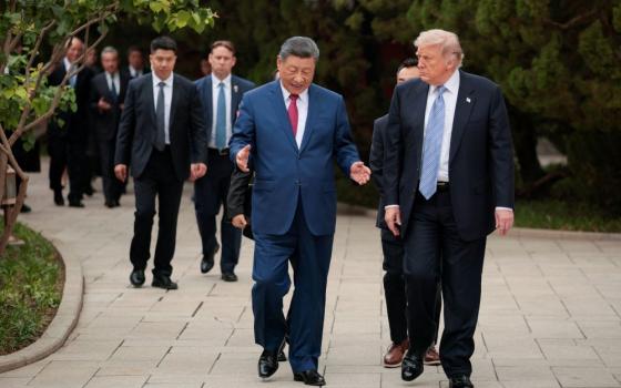 U.S. President Donald Trump walks with Chinese President Xi Jinping while leaving after a visit to the Zhongnanhai Garden in Beijing, May 15, 2026. (OSV News/Reuters/Evan Vucci)