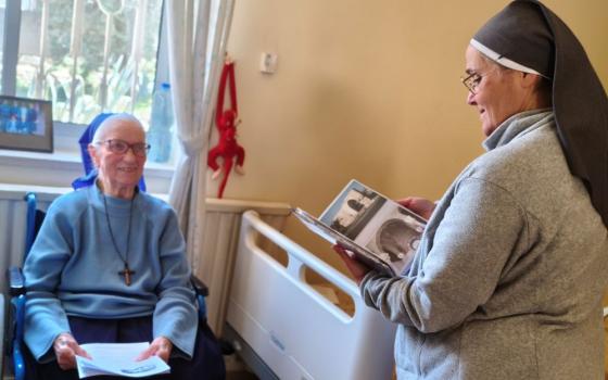 Home Notre Dame des Douleurs resident Sr. Rose Veplad, a member of the Little Sisters of Jesus congregation originally from Germany who has spent 60 years in Israel, enjoys a visit with home assistant manager Sisters of Daughters of Our Lady of Sorrows Sr. Claire-Emmanuel Pontroué. (Judith Sudilovsky)