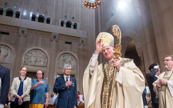 Archbishop Timothy Broglio of the U.S. Archdiocese for the Military Services, gestures as he arrives to concelebrate the annual Pilgrimage and Memorial Mass at the Basilica of the National Shrine of the Immaculate Conception in Washington May 17, 2026. Memorial Day is observed May 25 this year. (OSV News/Catholic Standard/Mihoko Owada)