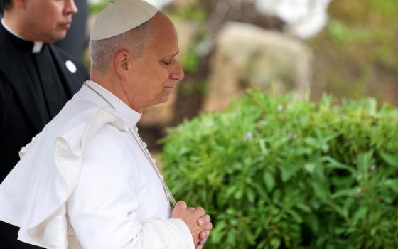 Pope Leo XIV prays during a visit to the archaeological site of Hippo in Annaba, Algeria, April 14, 2026. The site represents the ancient city where St. Augustine, the founder of the pope's religious order, served as bishop in the 4th century. (CNS/Lola Gomez)