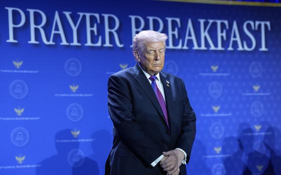 President Donald Trump bows his head during the National Prayer Breakfast Feb. 5, 2026, in Washington. (AP/Evan Vucci)