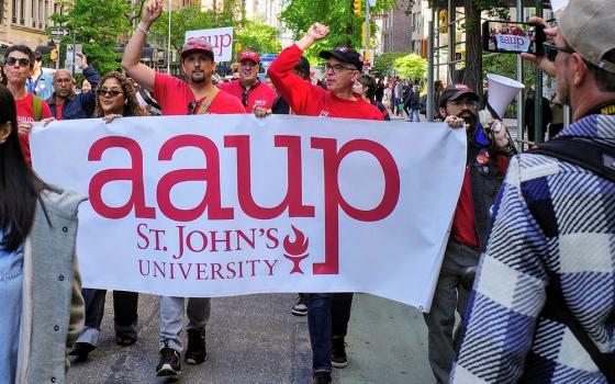 Members of the St. John's University chapter of the American Association of University Professors march May 1, 2026, in New York City. (Courtesy of the St. John's University chapter of the American Association of University Professors)