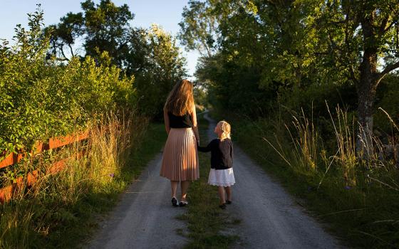 The questions raised by the "tradwife" phenomenon are high stakes, so much so that its comedy is easily overlooked. With her debut novel, Yesteryear, Caro Claire Burke succeeds in conveying the humor of a complicated drama. (Unsplash/Jon Flobrant)