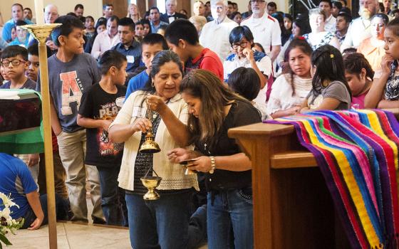 Catholics of Mayan ancestry attend Mass at St. Thomas Aquinas Church in Cookeville, Tenn., July 8, 2017. The Mass was part of a national Mayan conference celebrating traditional music, culture and spirituality. (CNS/Tennessee Register/Theresa Laurence)