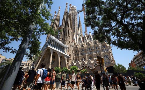 Groups of tourists walk around the Basilica of the Holy Family, known in Spanish as Sagrada Familia, in Barcelona, Spain, June 30, 2025. (OSV News/Reuters/Albert Gea)