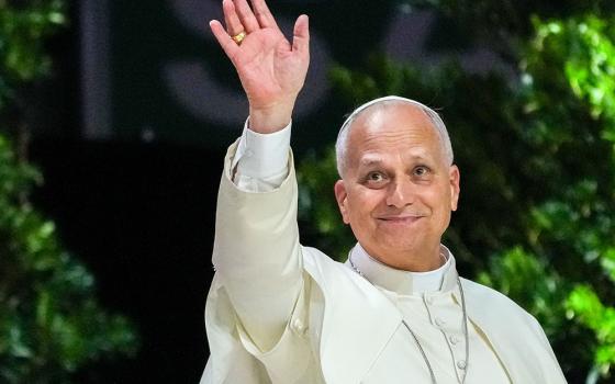 Pope Leo XIV greets people gathered for the “Building Networks with the World of Culture, Art, Economy and Sport” meeting at the Movistar Arena in Madrid June 7, 2026. (CNS/Lola Gomez)
