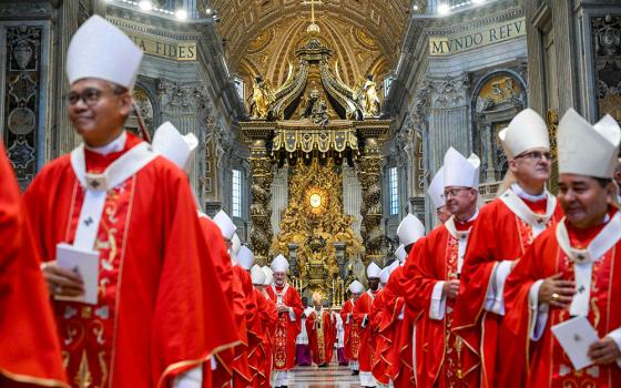 Prelates process after Pope Leo XIV celebrated Mass with the blessing and imposition of the pallium on new metropolitan archbishops on the feast of Sts. Peter and Paul in St. Peter's Basilica at the Vatican June 29, 2026. (OSV News/Vatican Media/Simone Risoluti)