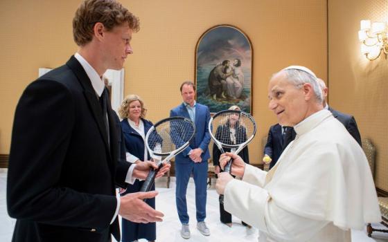 Italy's top-ranked tennis player Jannik Sinner, left, shares a light moment with Pope Leo XIV during a meeting at the Vatican May 14, 2025. (AP/Vatican Media)