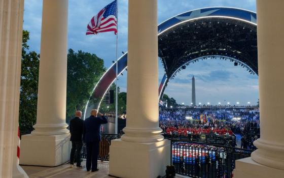 President Donald Trump and UFC CEO Dana White observe the National Anthem before the UFC Freedom 250, the mixed martial arts event produced by the Ultimate Fighting Championship June 14, 2026, in the Grand Foyer of the White House. (White House/Abe McNatt)