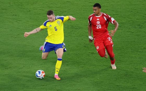 Sweden's Gabriel Gudmundsson and Tunisia's Yan Valery interact during the FIFA World Cup 2026 Group F Sweden vs. Tunisia at Estadio Monterrey, Monterrey, Mexico, June 14, 2026. (OSV News/Reuters/Raquel Cunha) 