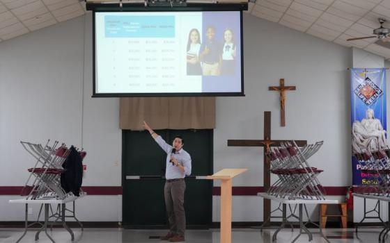 Oscar Ortiz, representing the Catholic Diocese of Fort Worth, speaks at St. George Catholic School during a session with parents on Texas’ private school voucher program  Jan. 21, 2026, in Fort Worth, Texas. (AP/Julio Cortez)