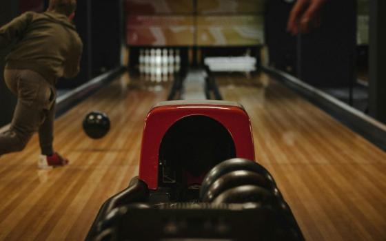 Person bowls.