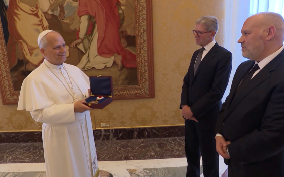 Pope Leo XIV receives the 2026 Liberty Medal from the National Constitution Center from the center's Interim President and CEO Vince Stango and Chair Mike George during a Vatican ceremony on April 30. (Courtesy of the National Constitution Center)