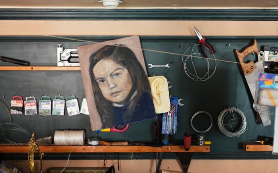 A childhood self-portrait by Paula Alonso-Pimentel hangs in the studio of her apartment in Madrid, Spain, Thursday, May 21, 2026. 