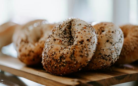 Bagels on a board (Unsplash/Claudio Schwarz)