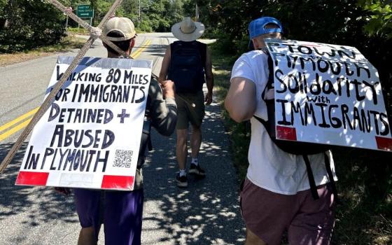 Massachusetts Catholic teachers Connor May and Chris Tansey walk during their July 2026 80-mile pilgrimage in support of immigrants. (Courtesy of Connor May)