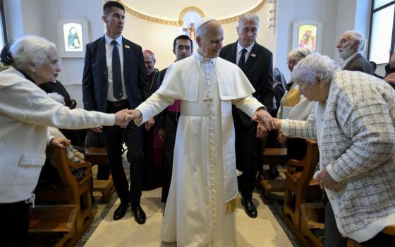 Pope Leo XIV greets residents of a home for the elderly run by the Little Sisters of the Poor in Istanbul during his visit Nov. 28, 2025. (OSV News/Vatican Media/Catholic Press Photo)